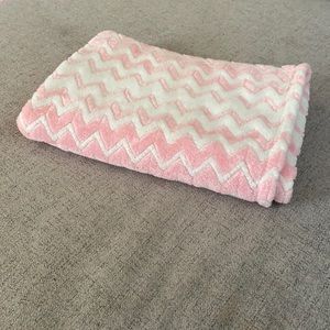 Pink and white baby blanket